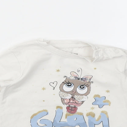 Close-up detail of PRIMIGI girls’ white geometric basic t-shirt, size 10, years