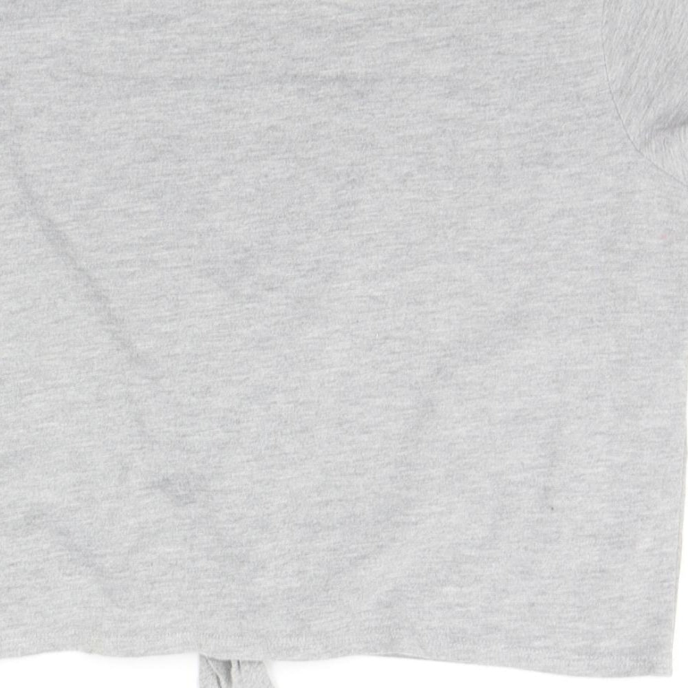 Brand and care label for Primark boys’ grey basic t-shirt, size 12-13, years