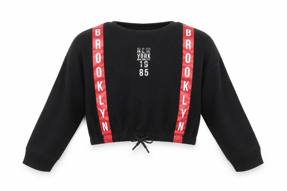 Front view of Primark girls’ black jumper, size 8-9, years