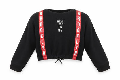 Front view of Primark girls’ black jumper, size 8-9, years