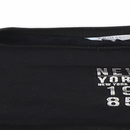 Close-up detail of Primark girls’ black jumper, size 8-9, years