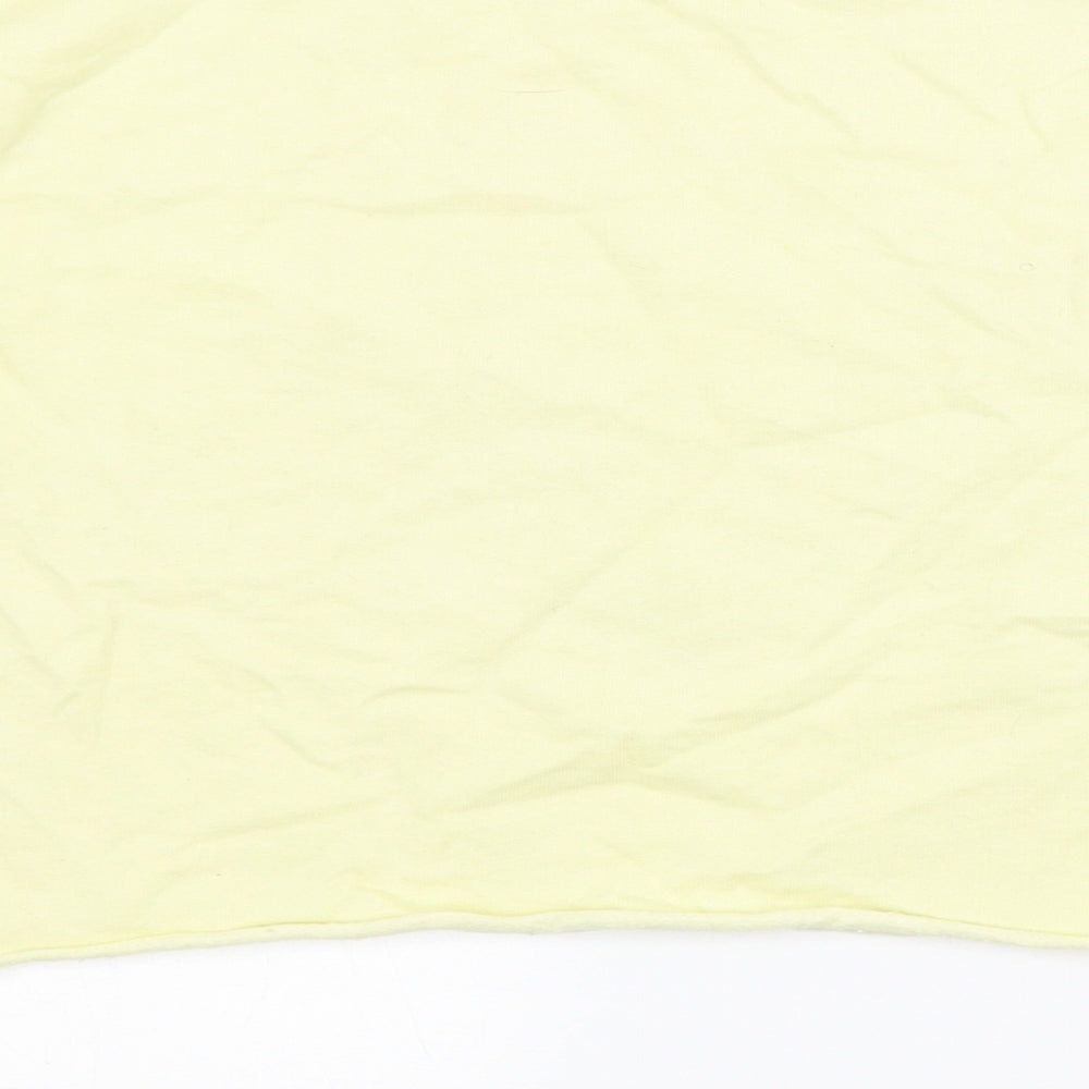 Brand and care label for Candy Couture girls’ yellow pullover sweatshirt, size 13, years