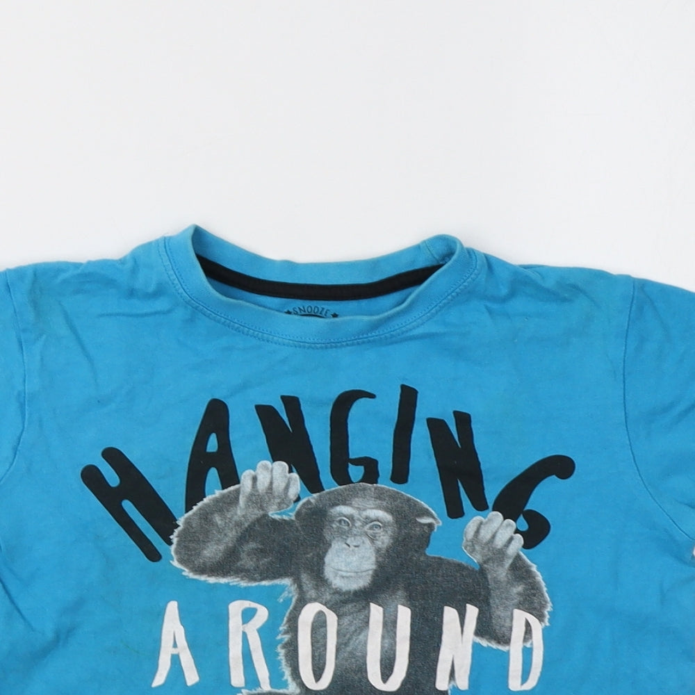 Close-up detail of Matalan girls’ blue basic t-shirt, size 6-7, years - monkey