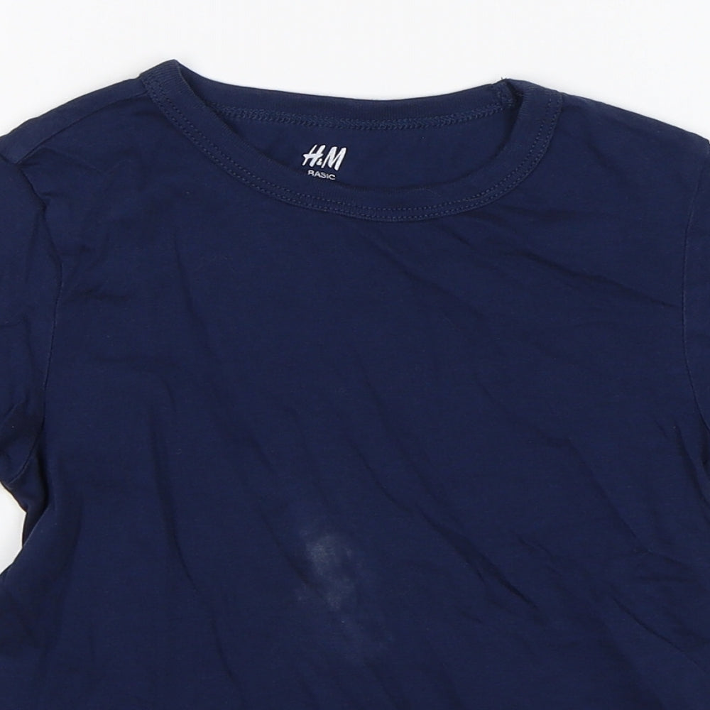 Close-up detail of H&M boys’ blue basic t-shirt, size 5-6, years