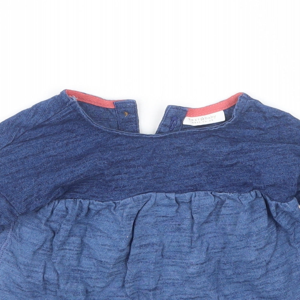 Close-up detail of Next girls’ blue basic t-shirt, size 3-6, months