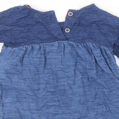 Brand and care label for Next girls’ blue basic t-shirt, size 3-6, months