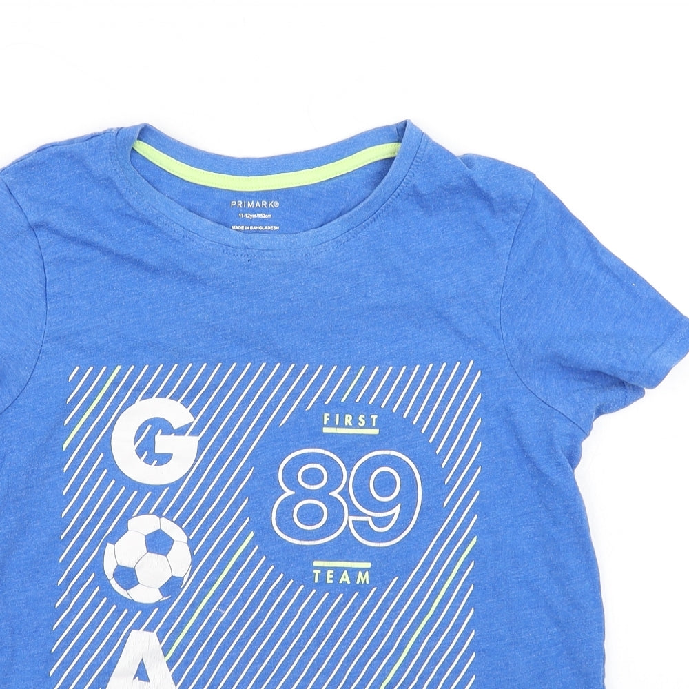 Close-up detail of Primark boys’ blue basic t-shirt, size 11-12, years