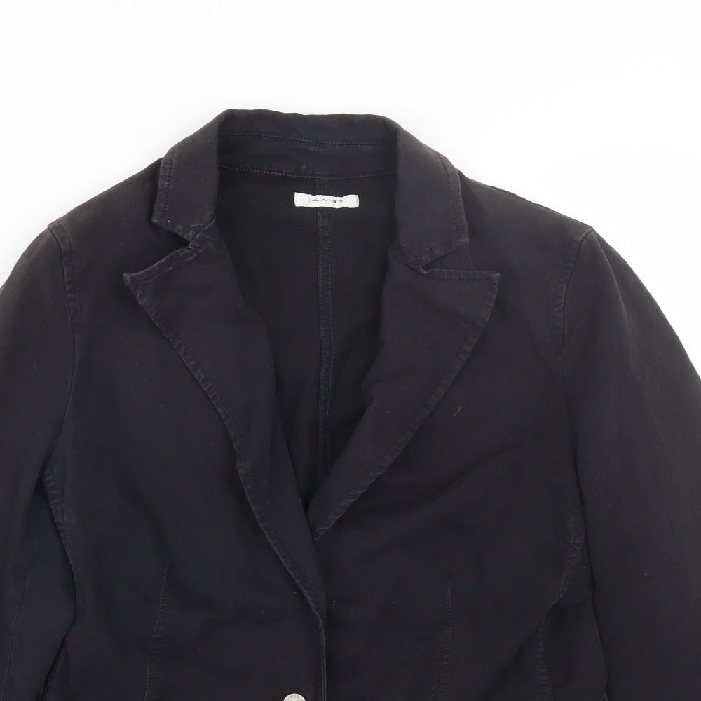 Close-up detail of Sand White women’s black jacket coat, size L