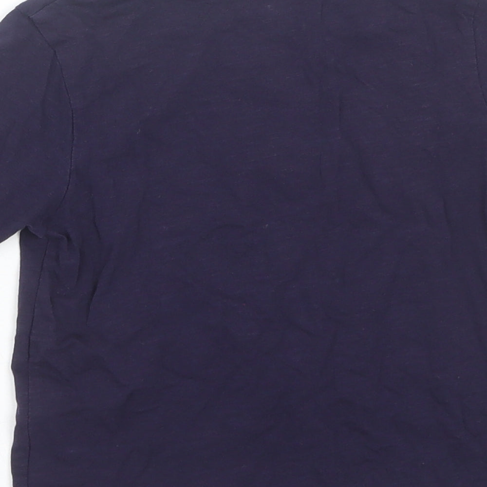 Brand and care label for Tu girls’ blue basic t-shirt, size 4, years