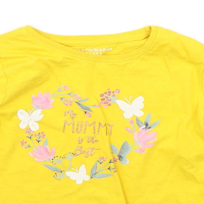 Close-up detail of Primark girls’ yellow houndstooth basic polo, size 5-6, years
