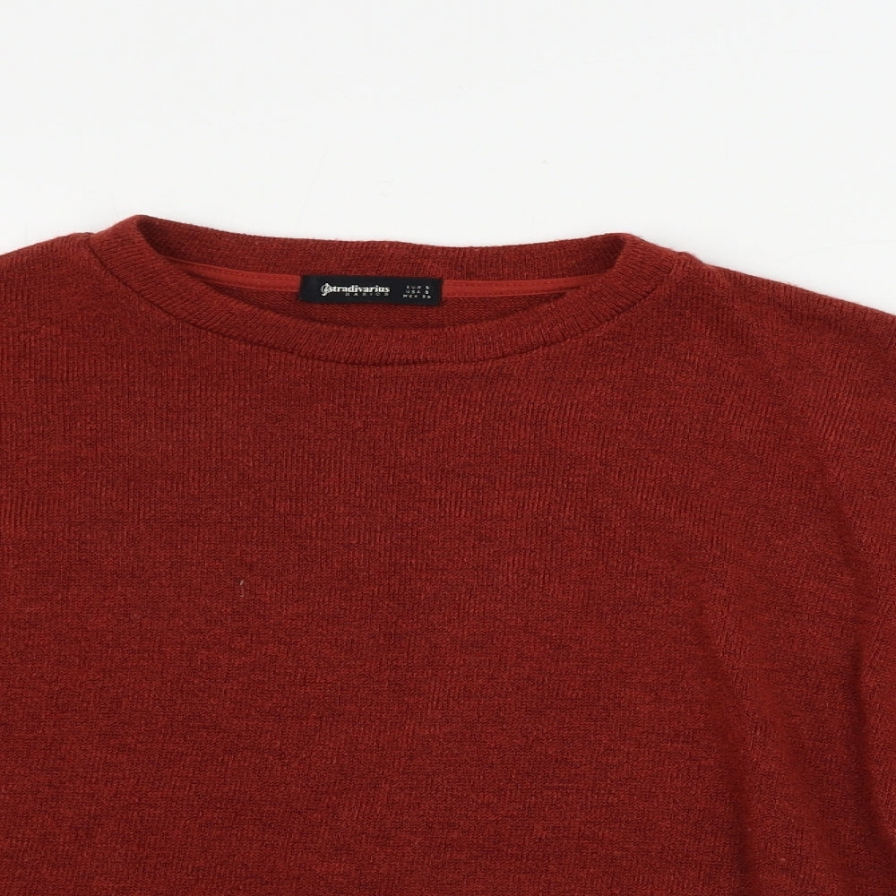 Close-up detail of Stradavarius women’s orange jumper, size S