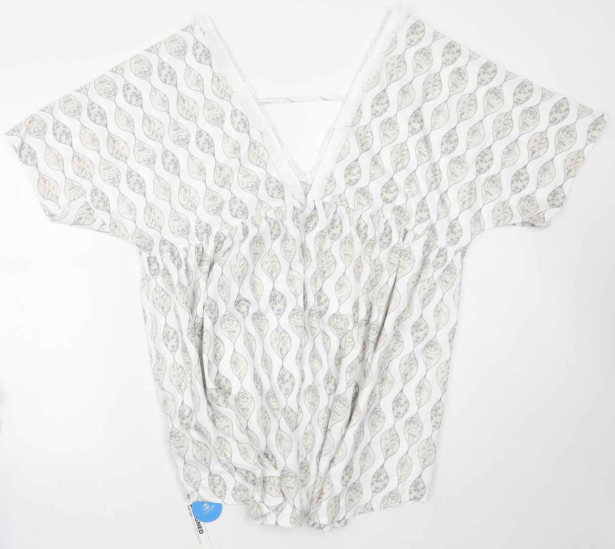 Back view of Cupshe women’s white floral a-line, size S