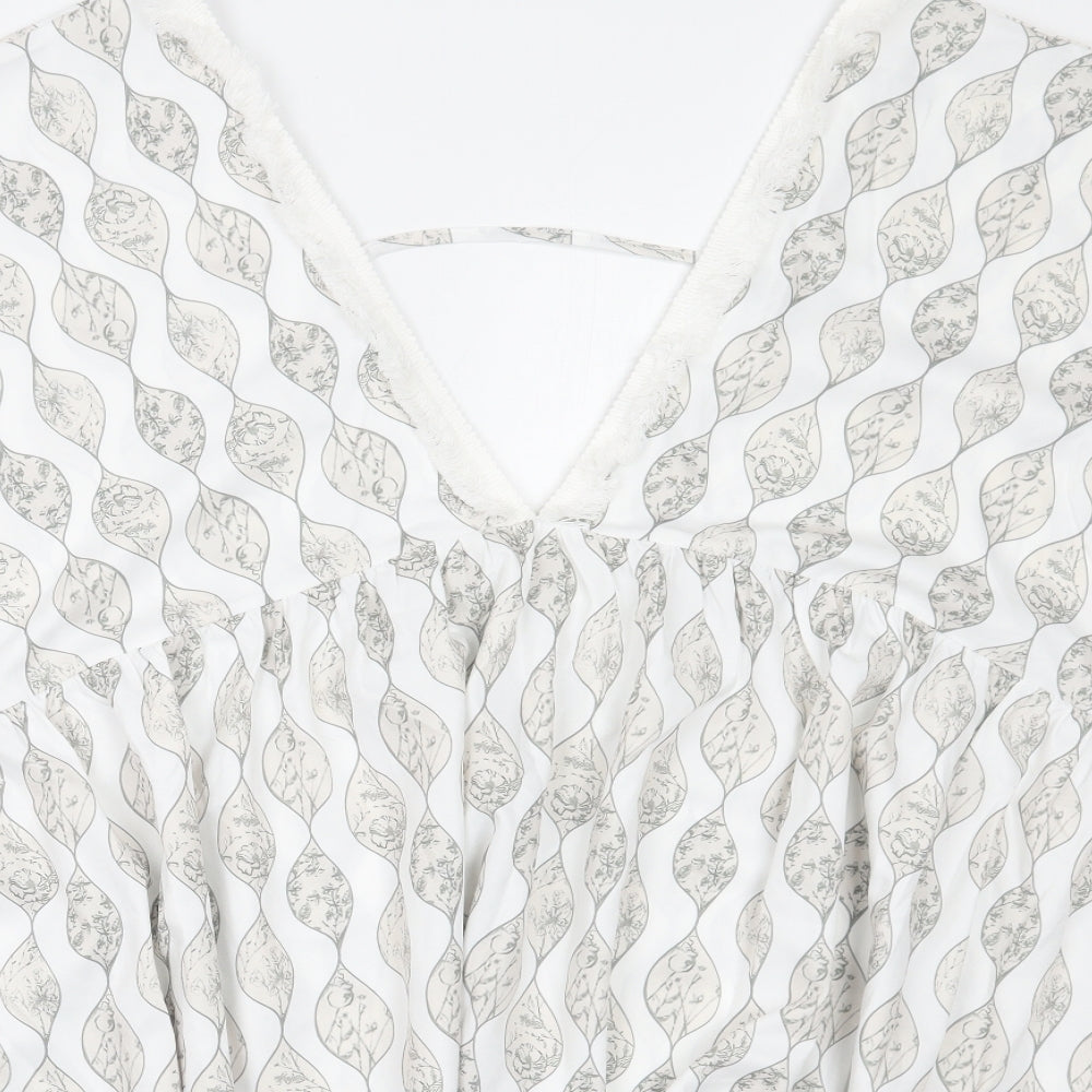 Close-up detail of Cupshe women’s white floral a-line, size S