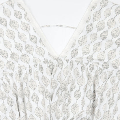 Close-up detail of Cupshe women’s white floral a-line, size S