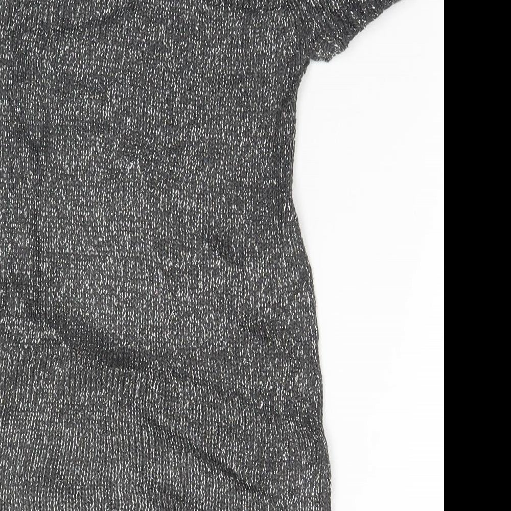 Brand and care label for Jillian's Closet women’s silver jumper, size UK 4
