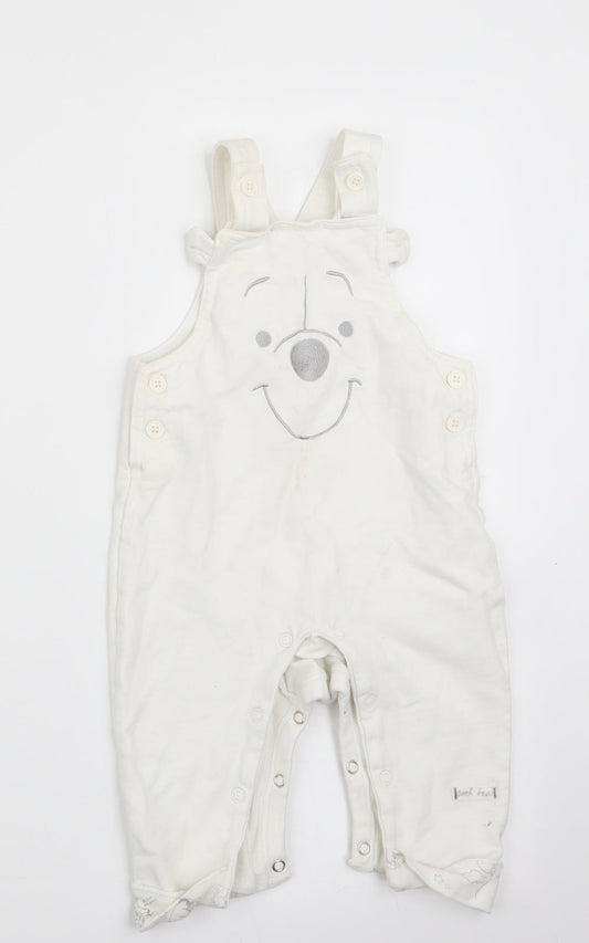 Front view of Disney by TU boys’ white animal print dungaree one-piece, size 6-9, months - polar bear face