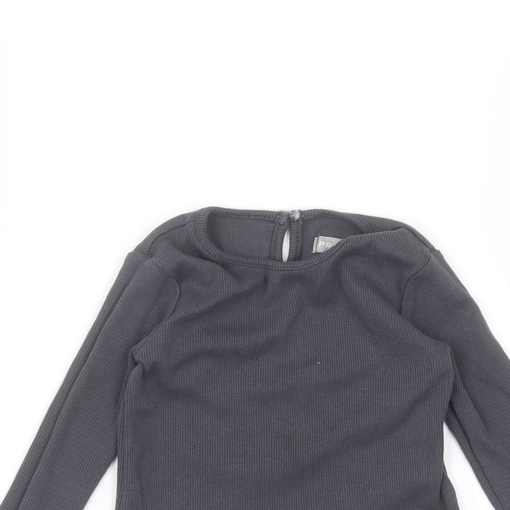 Close-up detail of Primark Baby Black Basic T-Shirt, size 18-24, Months