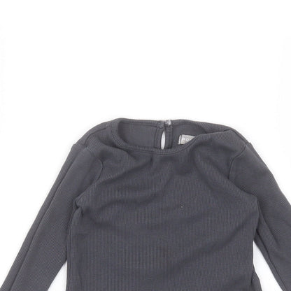 Close-up detail of Primark Baby Black Basic T-Shirt, size 18-24, Months