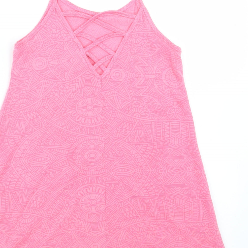 Brand and care label for Matalan girls’ pink basic tank, size 4, years