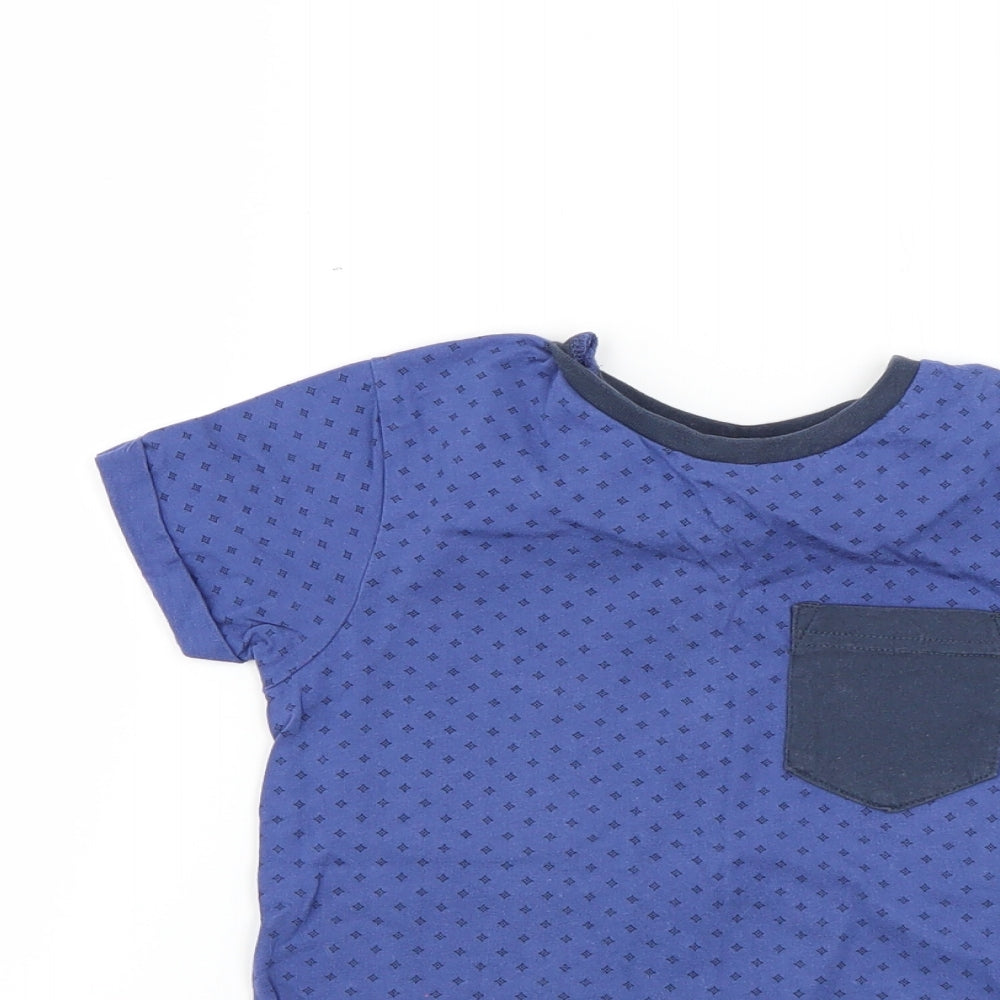 Close-up detail of George boys’ blue polka dot basic t-shirt, size 5-6, years