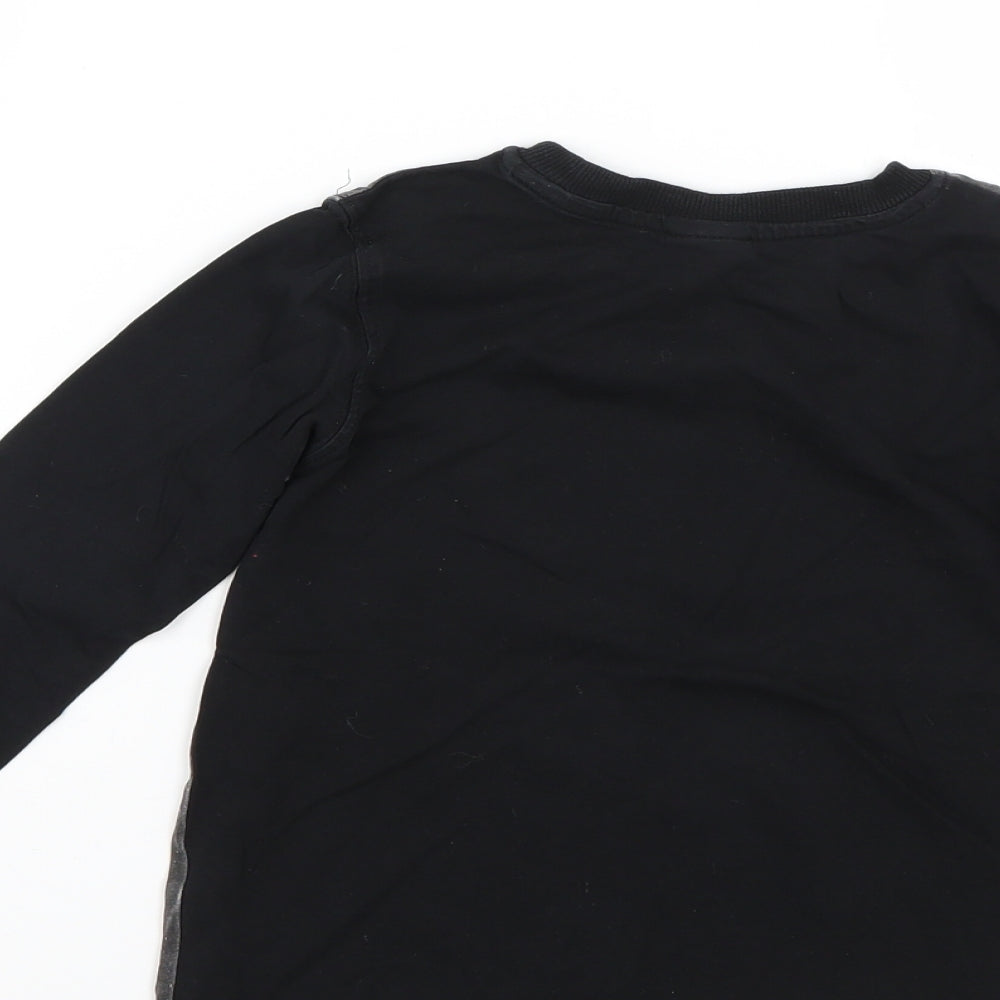 Brand and care label for George boys’ black basic t-shirt, size 4-5, years