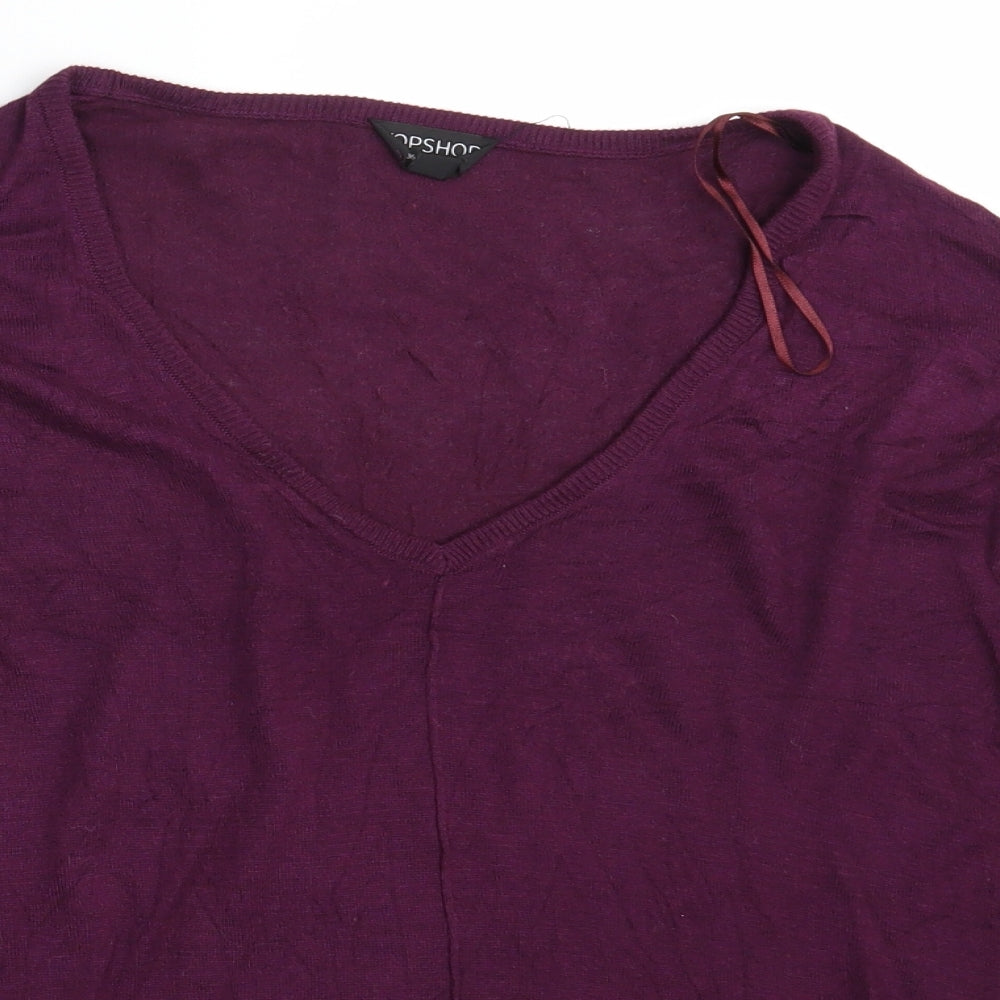 Close-up detail of Topshop women’s purple knit pullover sweatshirt, size UK 8