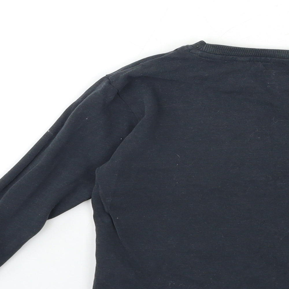 Brand and care label for Next girls’ grey pullover sweatshirt, size 4, years