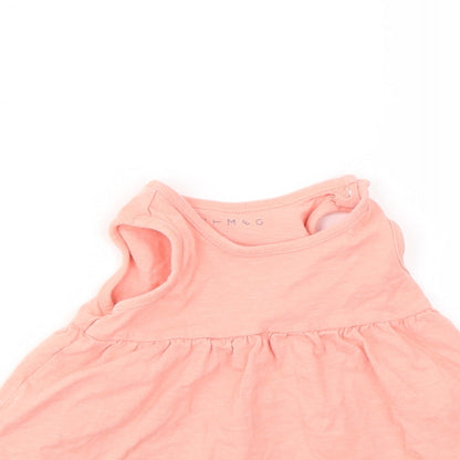 Close-up detail of Nutmeg girls’ pink basic t-shirt, size 3-6, months