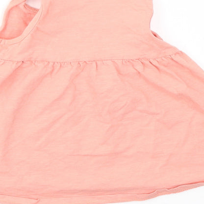 Brand and care label for Nutmeg girls’ pink basic t-shirt, size 3-6, months
