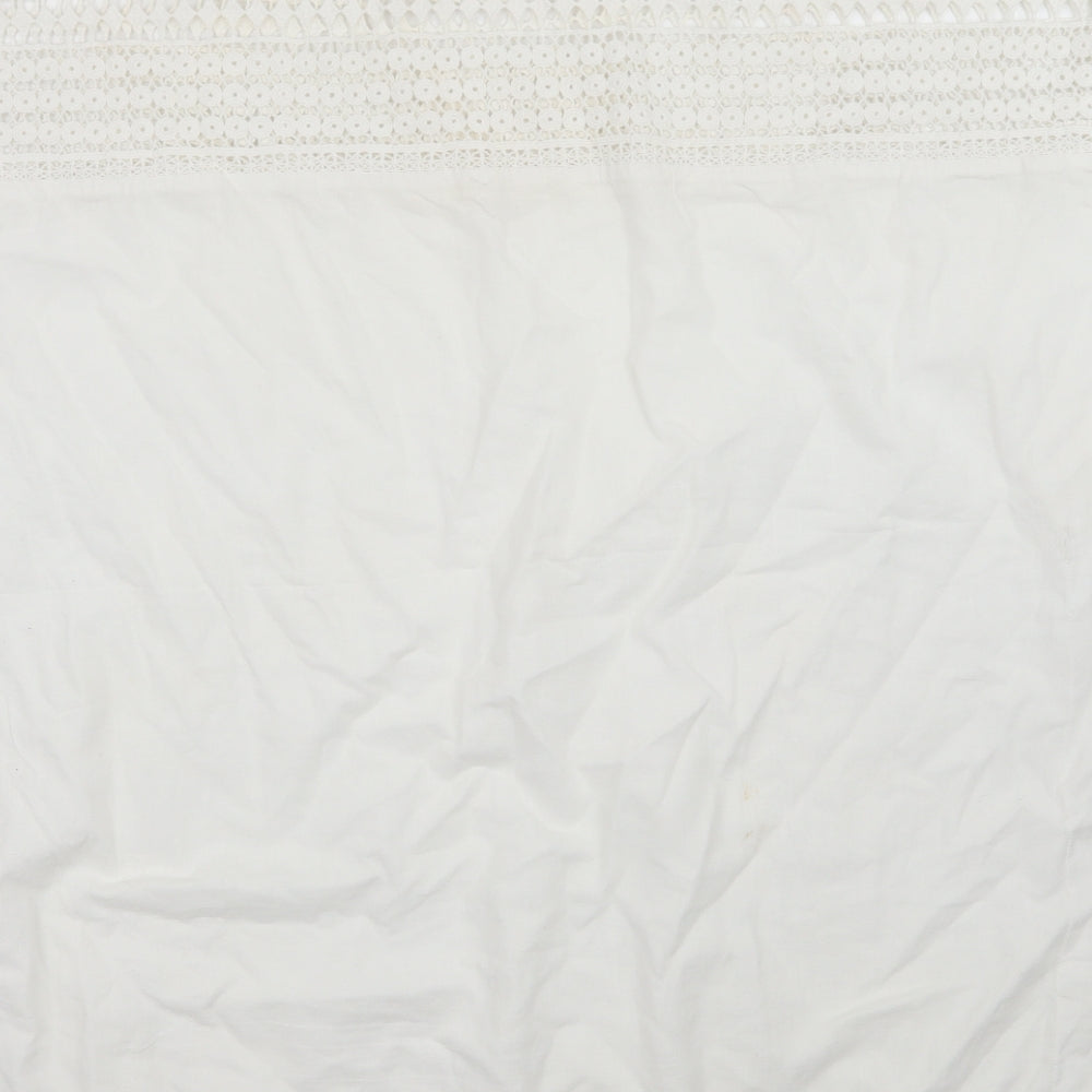 Brand and care label for Next beach women’s white a-line, size M