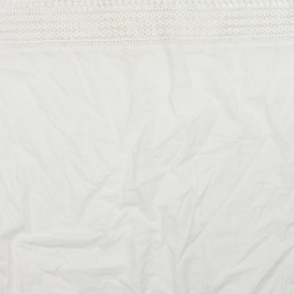 Brand and care label for Next beach women’s white a-line, size M