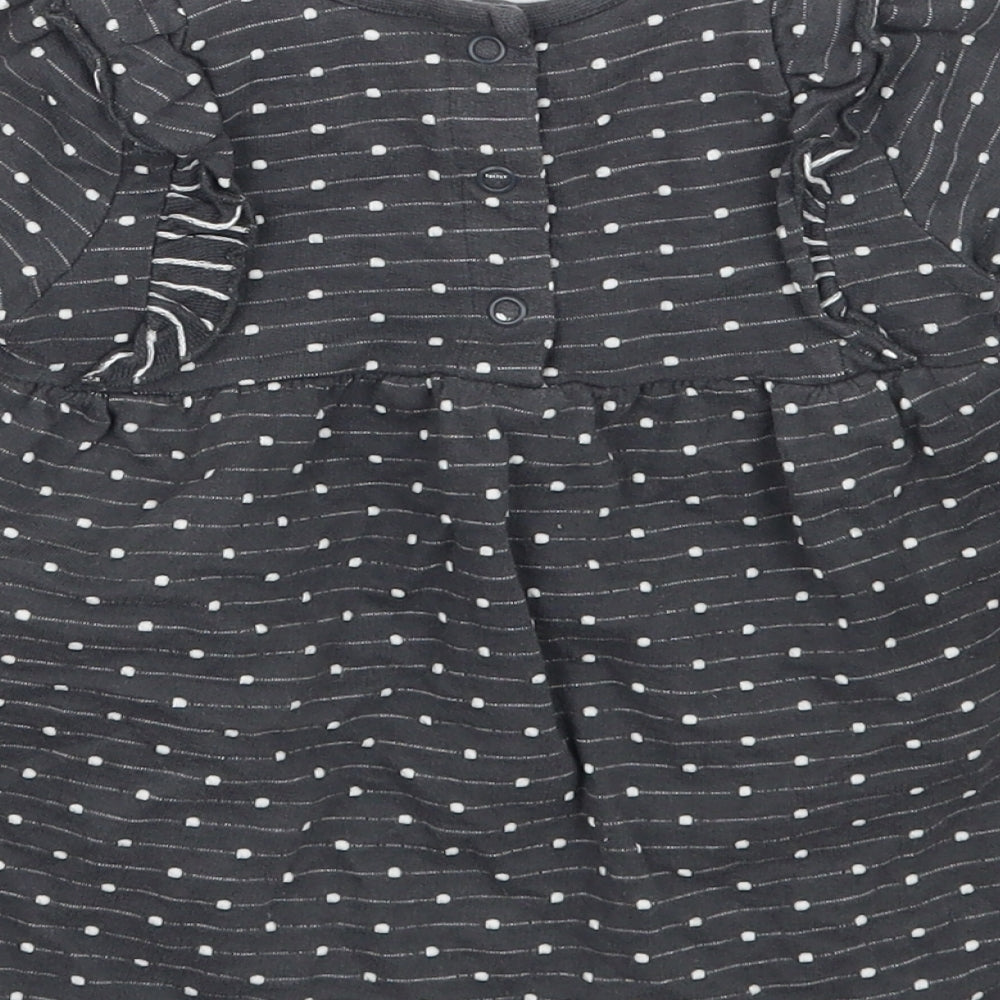 Brand and care label for George girls’ grey polka dot basic t-shirt, size 6-9, months