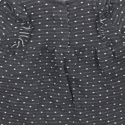 Brand and care label for George girls’ grey polka dot basic t-shirt, size 6-9, months