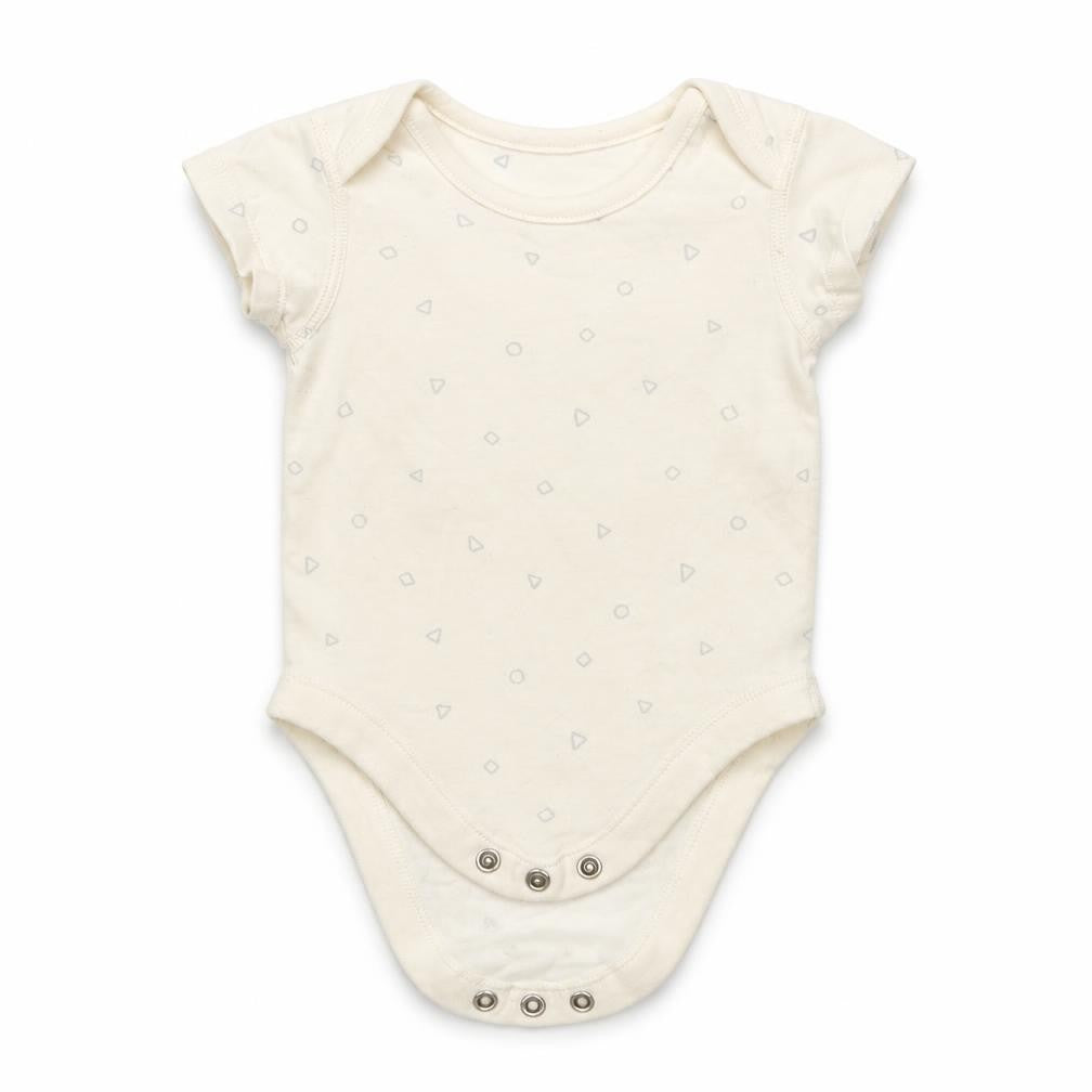 Front view of Marks & Spencer Baby Ivory Polka Dot Leotard One-Piece, size 0-3, Months