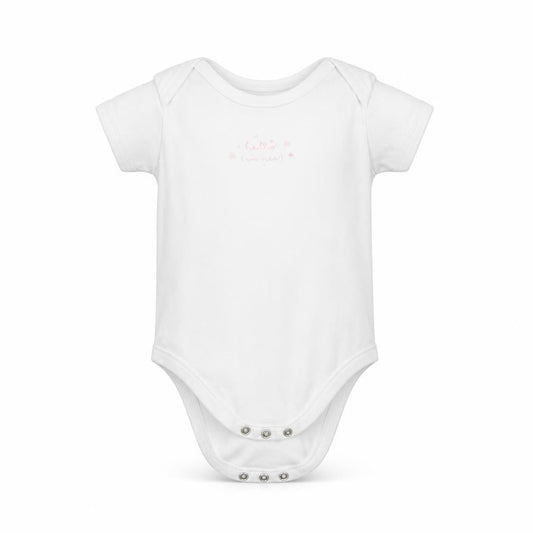 Front view of Matalan girls’ white romper one-piece, size 12-18, months