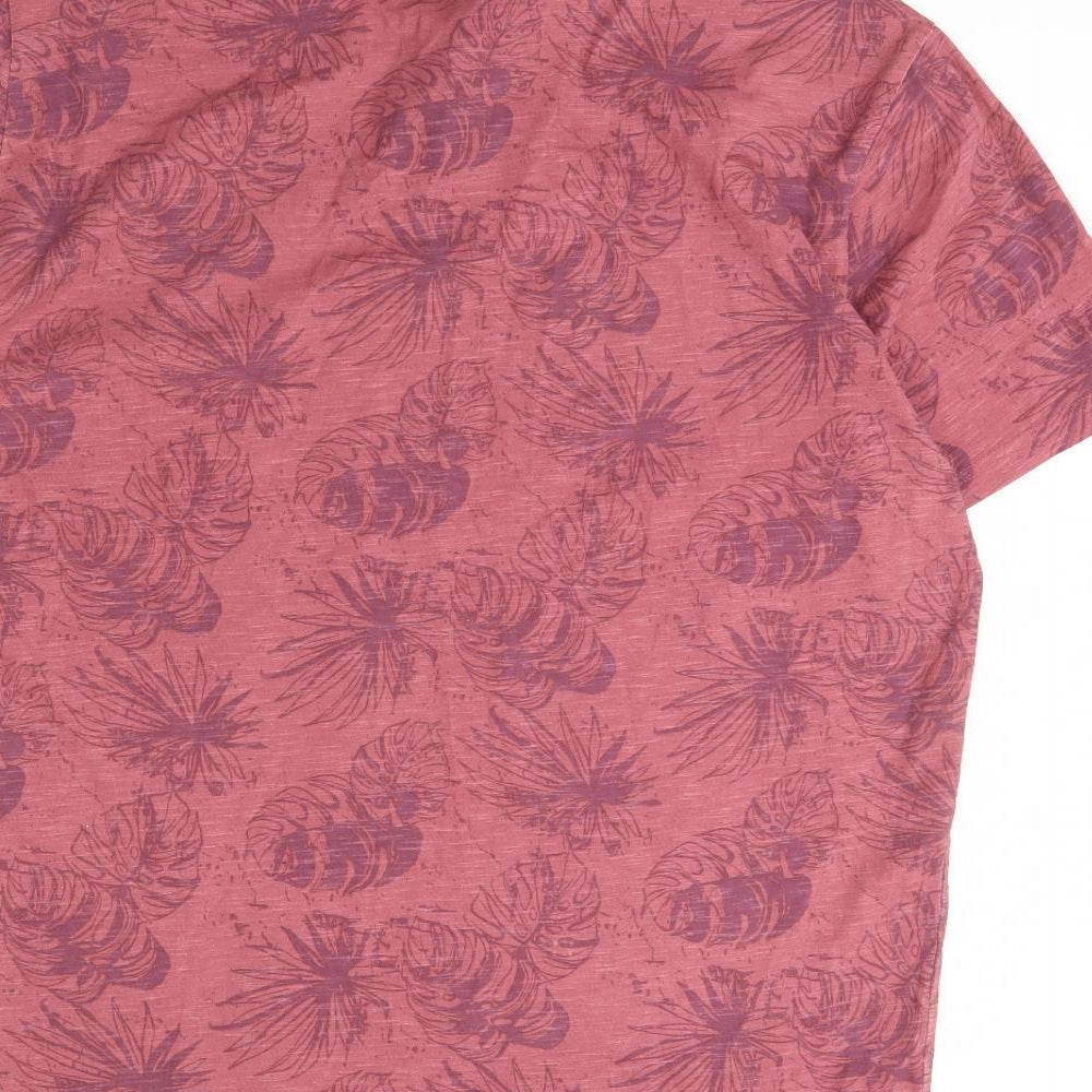 Brand and care label for George girls’ red floral basic polo, size XL