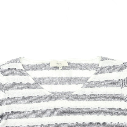 Close-up detail of net women’s white striped knit jumper, size UK 14