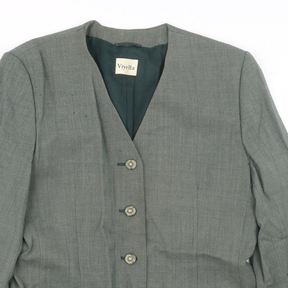 Close-up detail of Vityella women’s green polka dot jacket suit, size UK 14