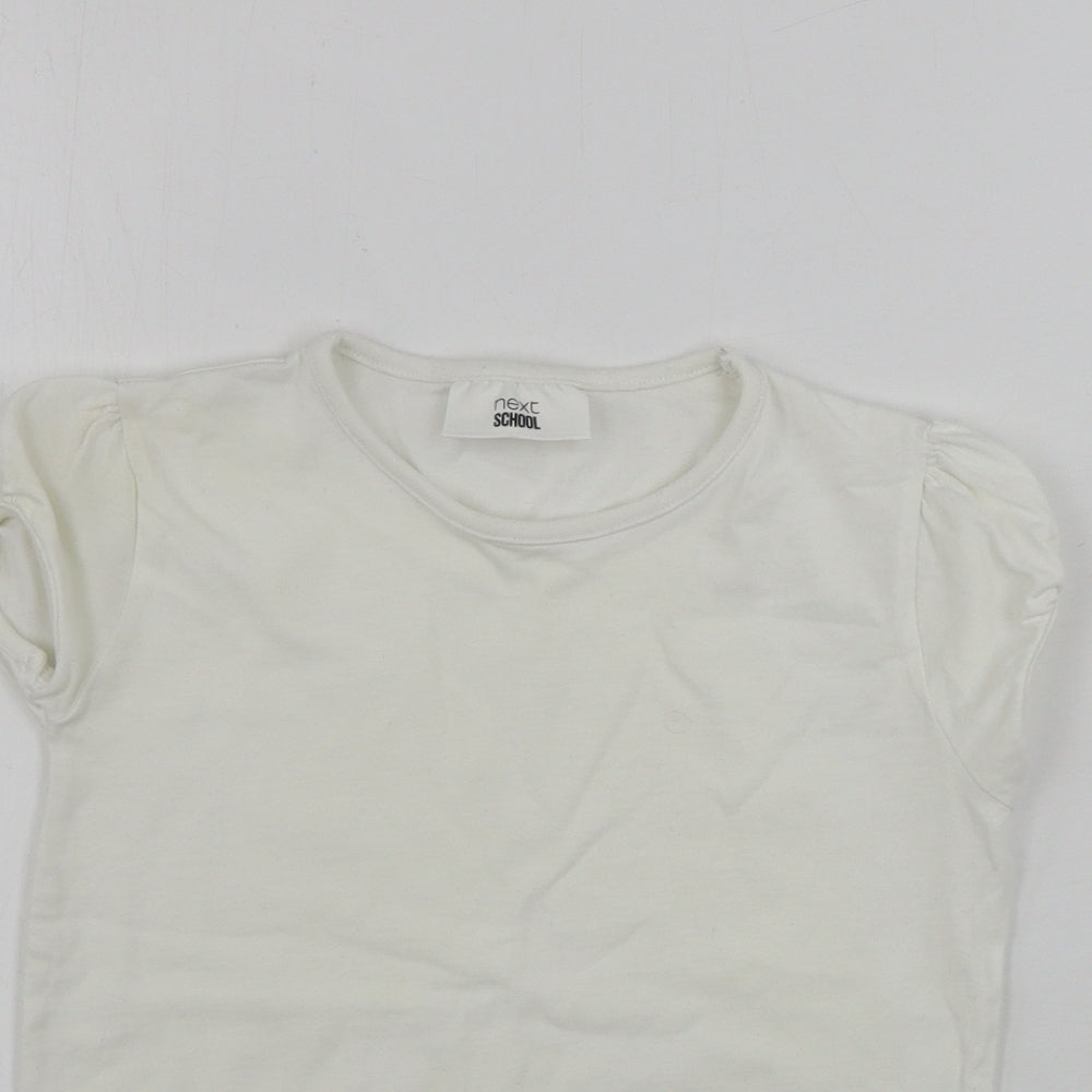 Close-up detail of Next girls’ white basic t-shirt, size 6, years