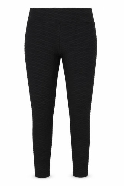 Front view of Preworn women’s black jegging leggings, size UK 32, in, 25-inch leg