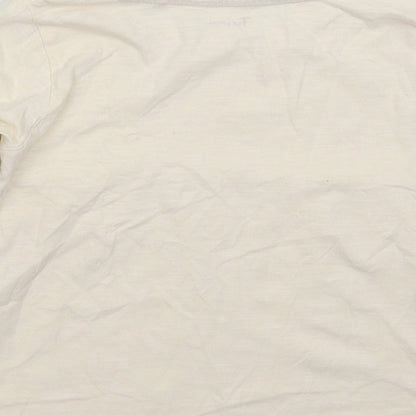 Brand and care label for Tu girls’ beige basic t-shirt, size 6-7, years