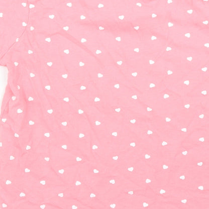 Brand and care label for Primark girls’ pink polka dot basic t-shirt, size 3, years