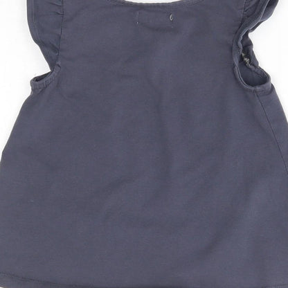 Brand and care label for Maggie & Zoe girls’ blue basic blouse, size 3-4, years