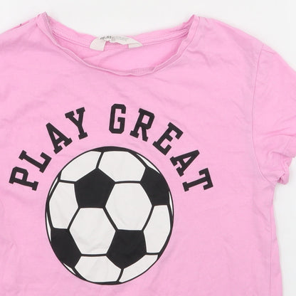 Close-up detail of H&M girls’ pink basic polo, size 8-9, years