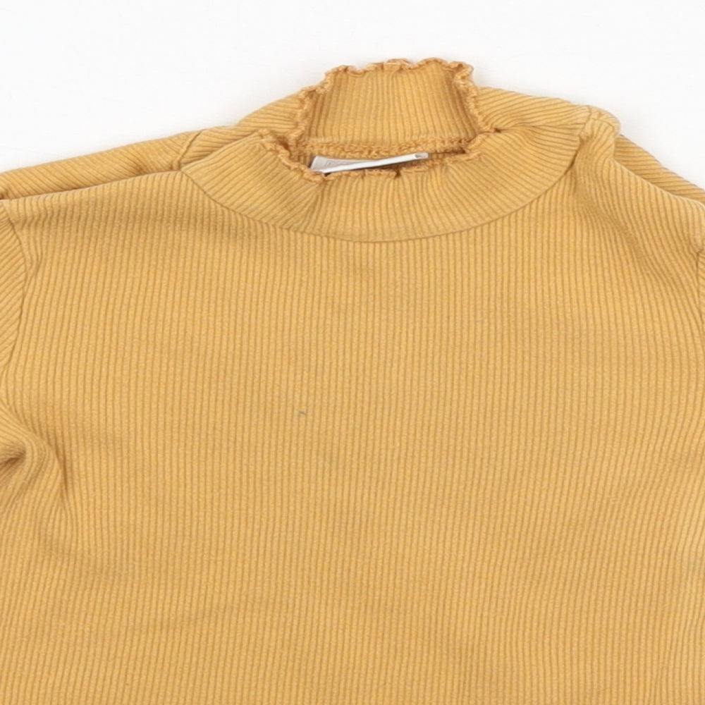 Close-up detail of F&F girls’ orange pullover, size 3-4, years