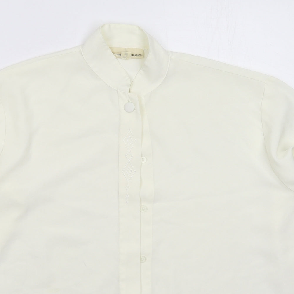 Close-up detail of Laura Gribby women’s white basic button-up, size UK 10