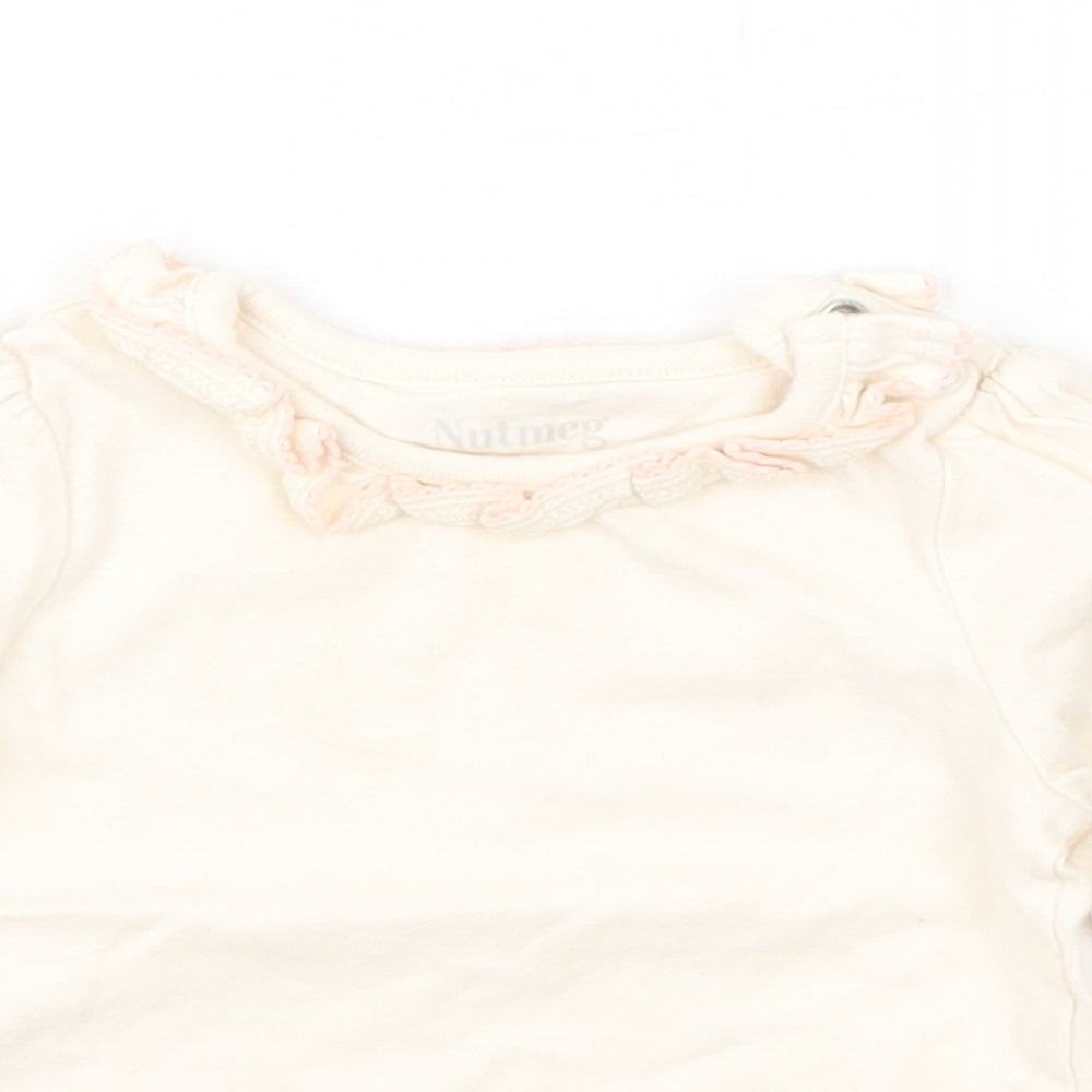 Close-up detail of Nutmeg girls’ pink basic t-shirt, size 0-3, months