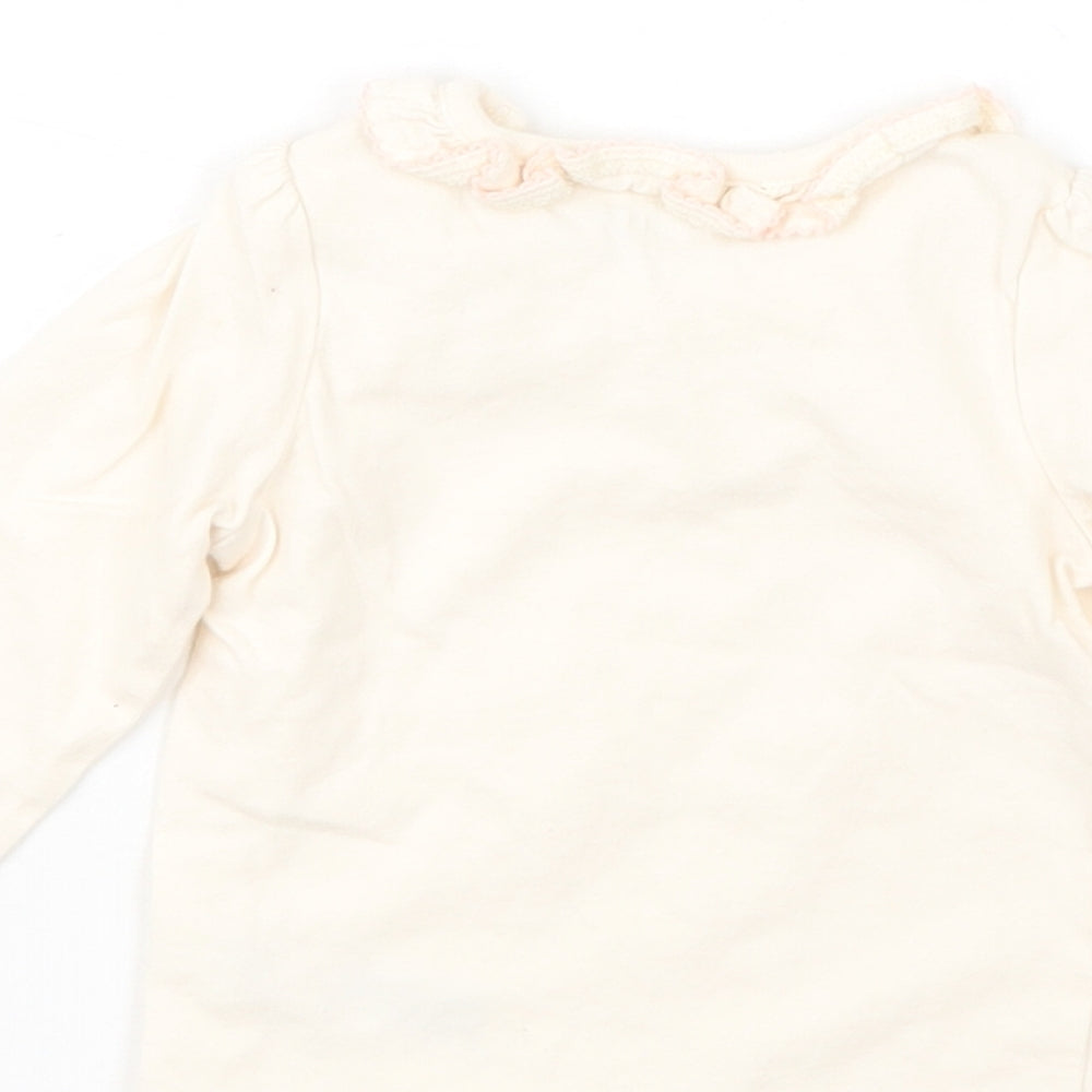 Brand and care label for Nutmeg girls’ pink basic t-shirt, size 0-3, months