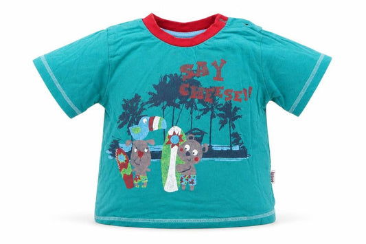 Front view of Aardvark boys’ blue basic t-shirt, size 18-24, months - say cheese