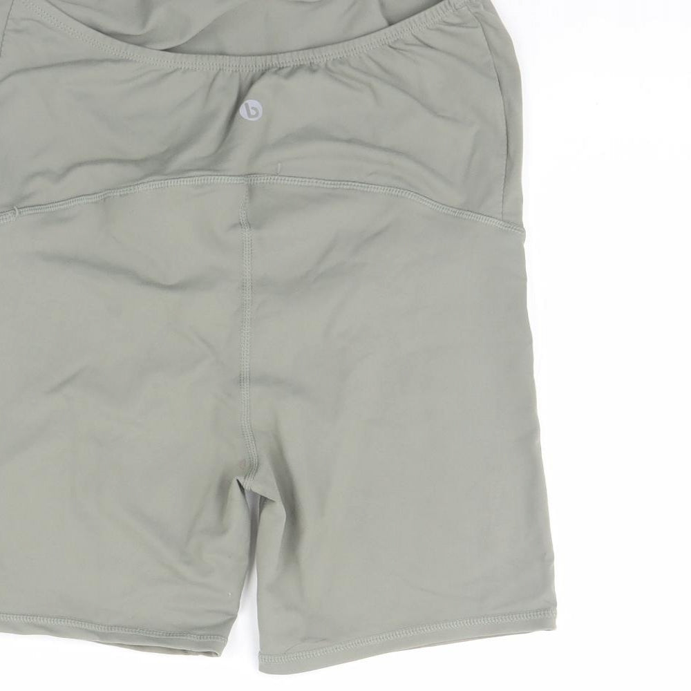 Brand and care label for Body women’s green compression shorts, size S